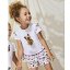 Conjunto camiseta blanca con short estampado perritos